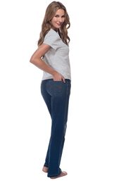 Model facing away and looking back at the camera, wearing Bootcut Vintage Wash PajamaJeans paired with a Heathered Gray Short-Sleeve T-shirt image number 2