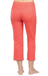 Model wearing PajamaJeans Capris - Coral, facing away from the camera image number 1