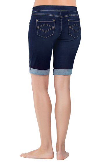 Close-up of model's waist and legs wearing PajamaJeans Bermuda Shorts Indigo, Cuffed, facing away from the camera