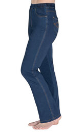 Model wearing PajamaJeans - High-Waist Bootcut Bluestone Wash facing away from the camera, displaying the side of the jeans image number 2